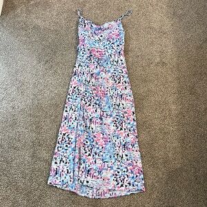 Patterned midi dress. Open back with adjustable straps and leg slit. Size small.